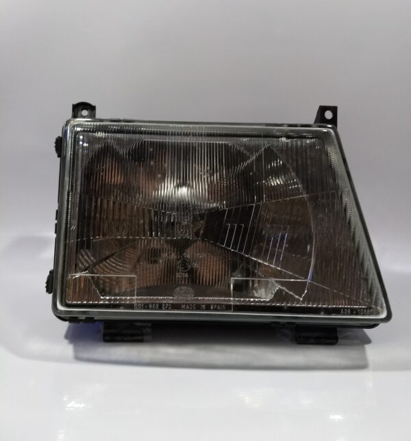 Farol MB180 original (Hella) lado direito